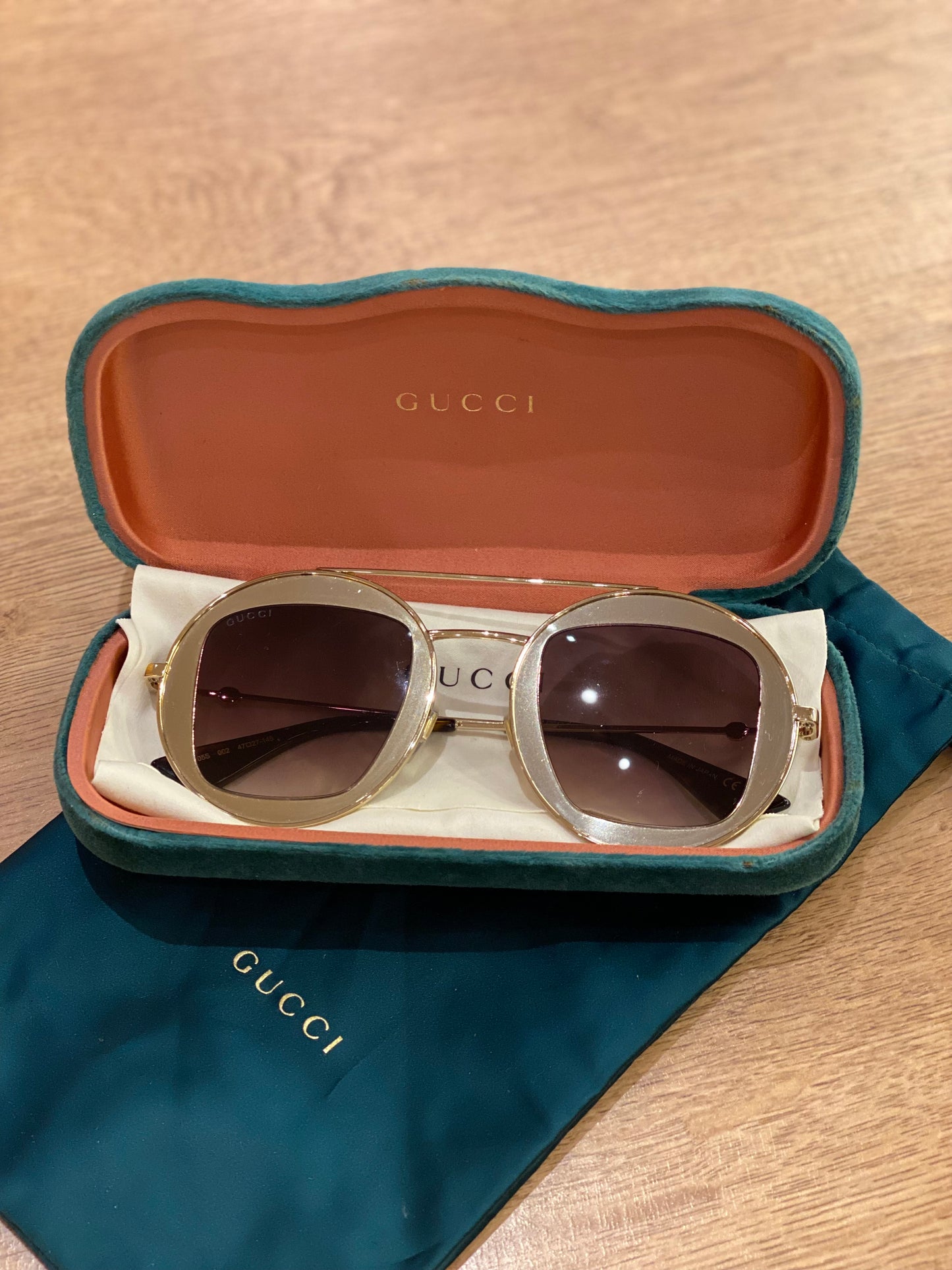 Lente de Sol Gucci Round Frame Gold