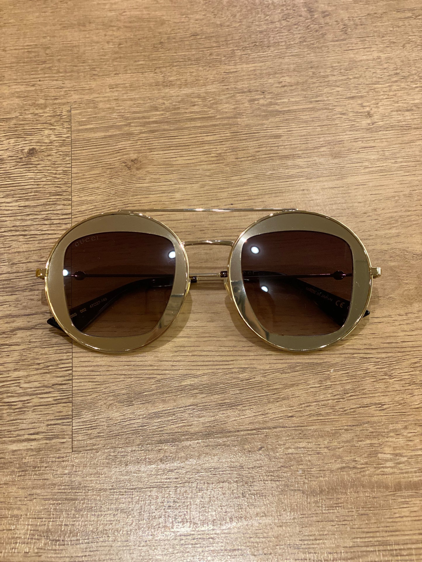 Lente de Sol Gucci Round Frame Gold