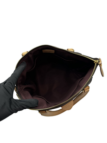 Cartera Louis Vuitton Rivoli MM