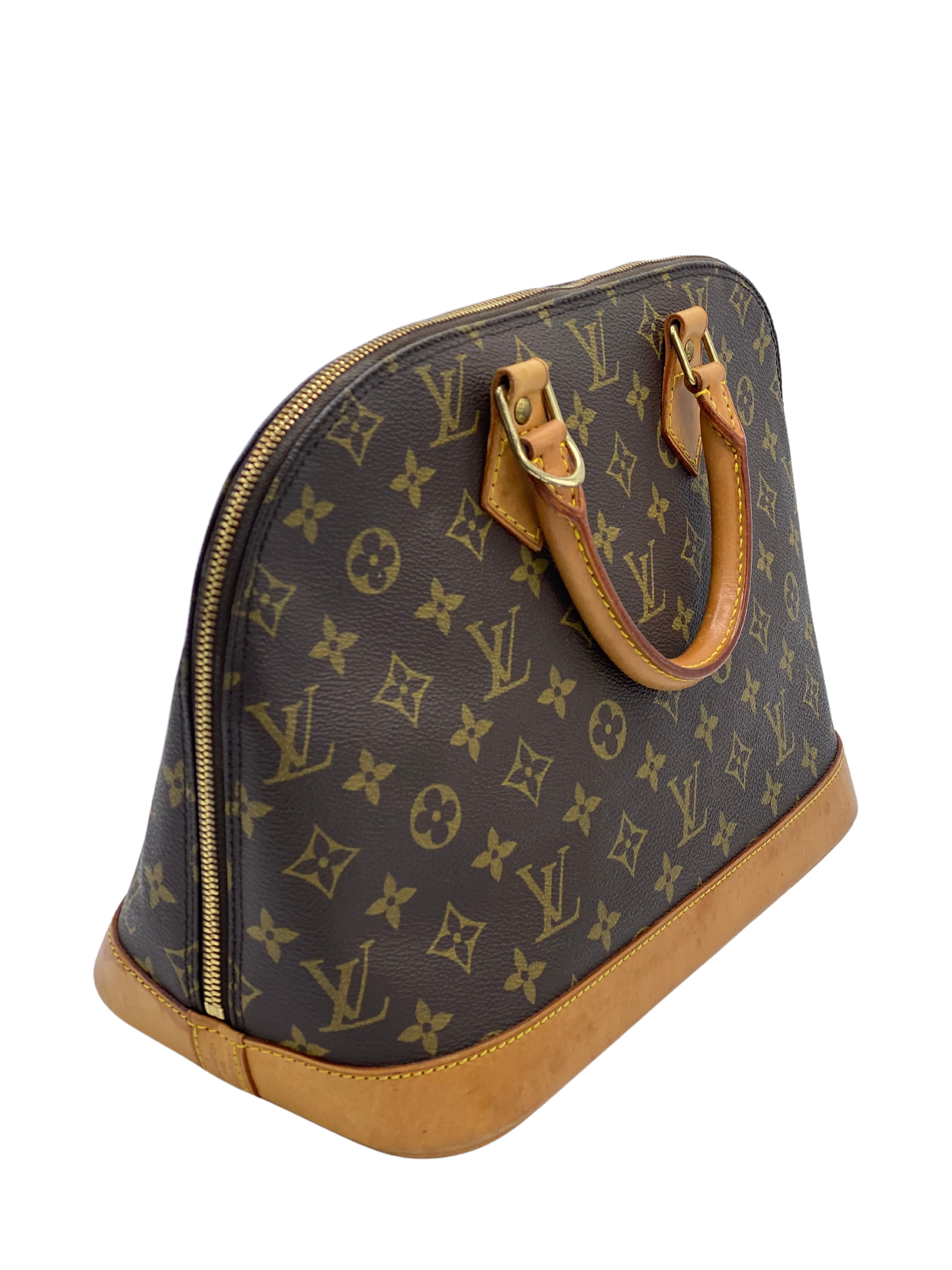 ⁠Cartera Louis Vuitton Alma Monogram MM