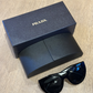 Lente de Sol Prada SPR 14W