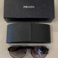 Lente de Sol Prada SPS 55Q