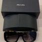 Lente de Sol Prada SPR16Y