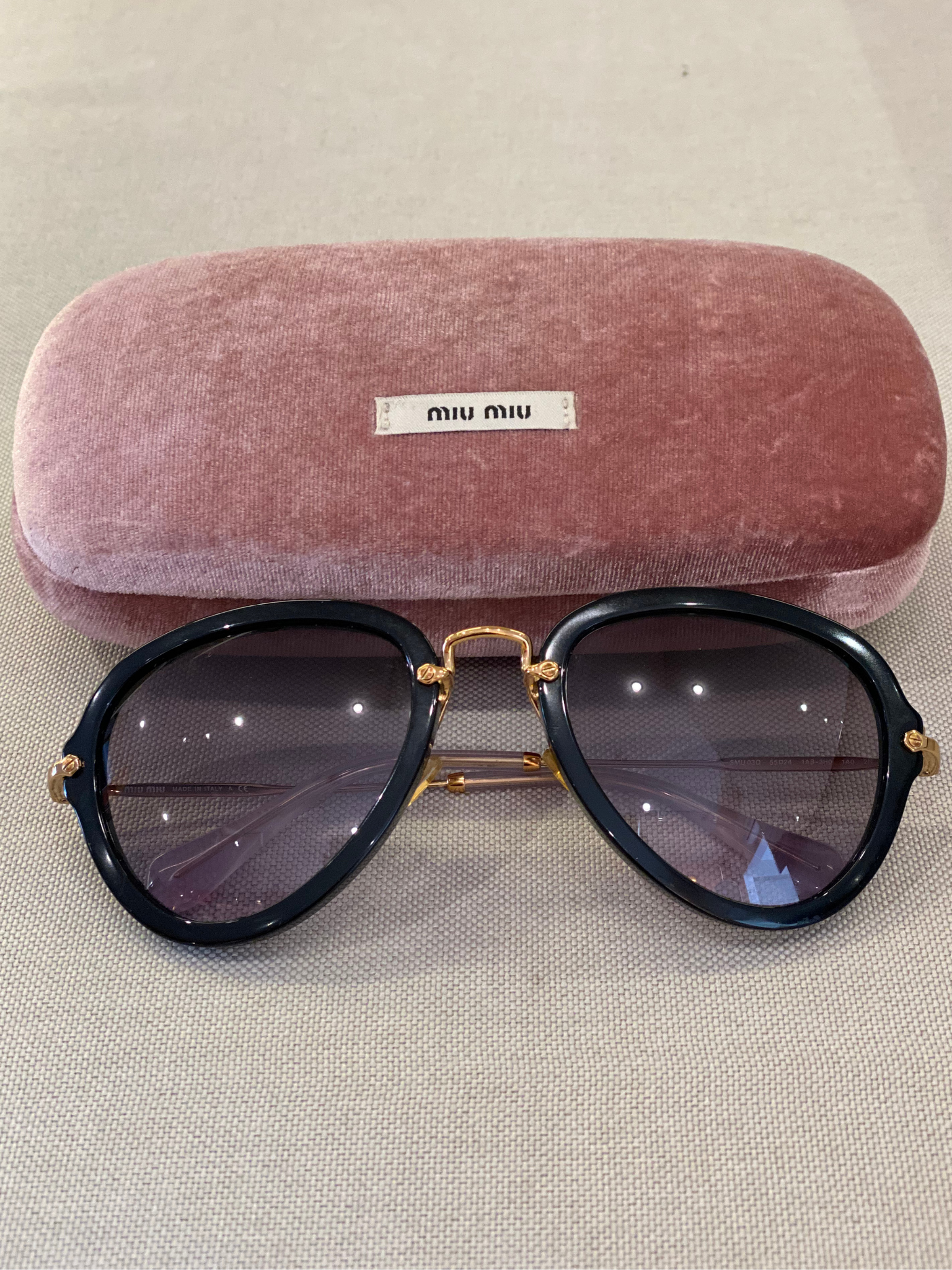 Lente de Sol MIU MIU SMU03Q