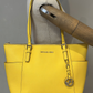 Cartera Mediana Amarilla Michael Kors