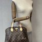Cartera Louis Vuitton Rivoli MM