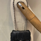 Mini Bolso Negro con Flecos Purificación García