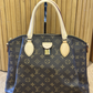 Cartera Louis Vuitton Rivoli MM