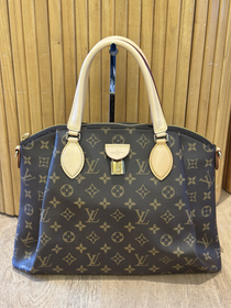 Cartera Louis Vuitton Rivoli MM