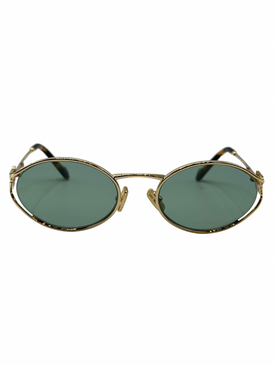 Lente de Sol Miu Miu SMU52Y