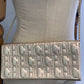 ⁠Bandolera y Clutch Carolina Herrera Monogram Metallic