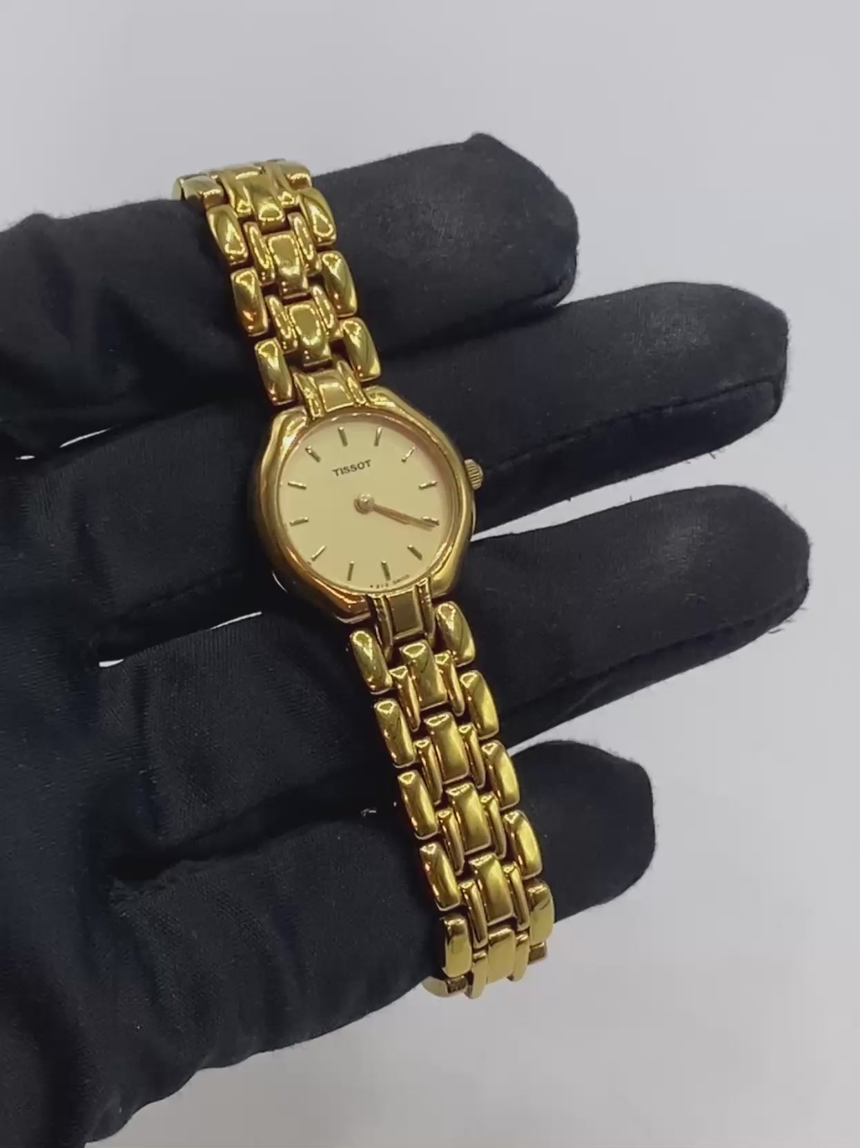Reloj Tono Dorado Tissot F213