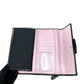 Billetera monogram Coach